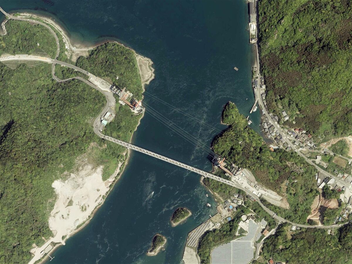 Aerial photograph of a bridge construction site showing structural progress from above