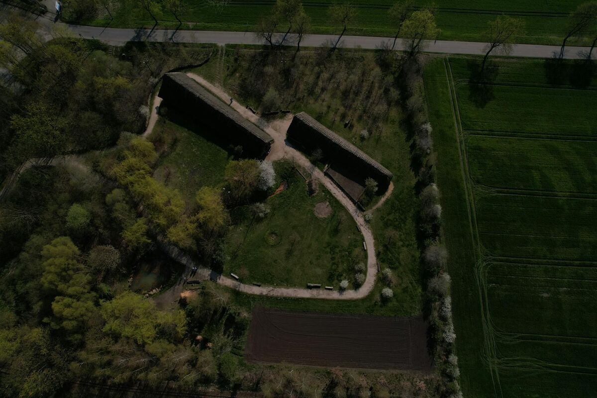 Aerial drone image of a reconstructed settlement, illustrating photogrammetry's role in capturing 3D spatial data from above