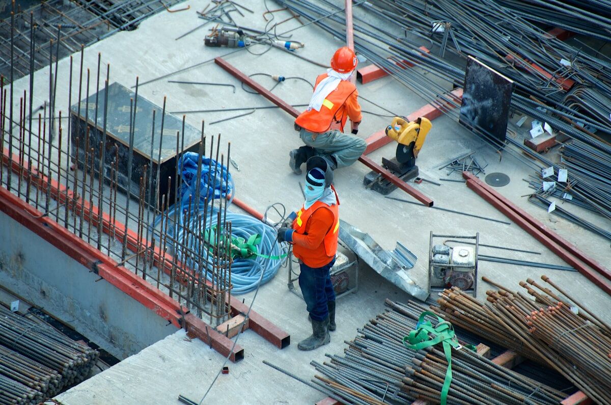 Active construction site with cranes and earthwork for 3D mapping documentation