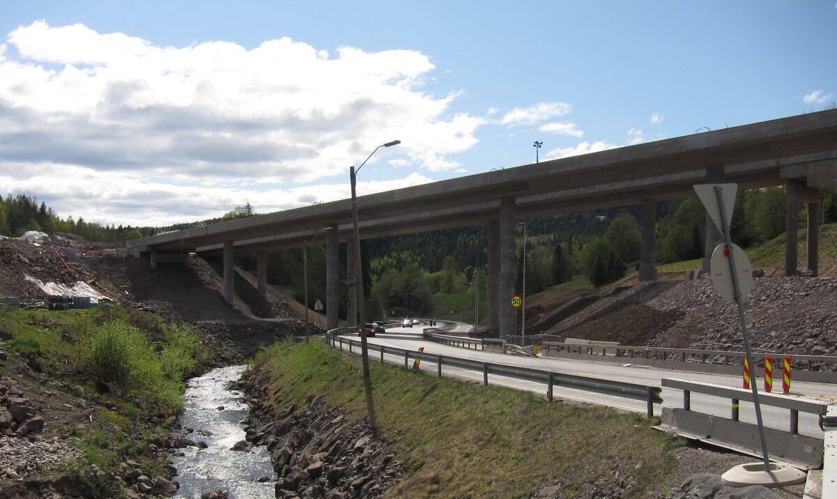 Road construction and grading work on a Norwegian highway project showing cut and fill earthwork