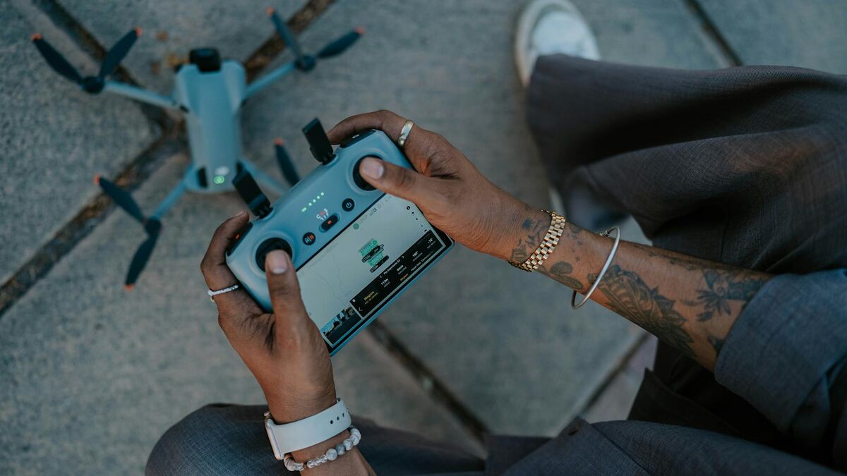 LiDAR point cloud of a highway corridor showing dense elevation data in color-coded false color