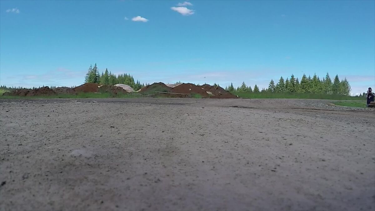 Drone operator conducting aerial survey in the field