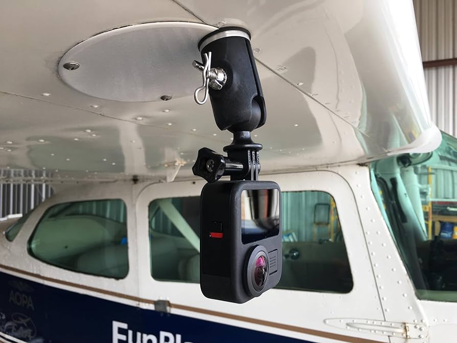 Civil Air Patrol Cessna 172 aircraft equipped with wing-mounted GoPro Hero 6 camera for coastline mapping